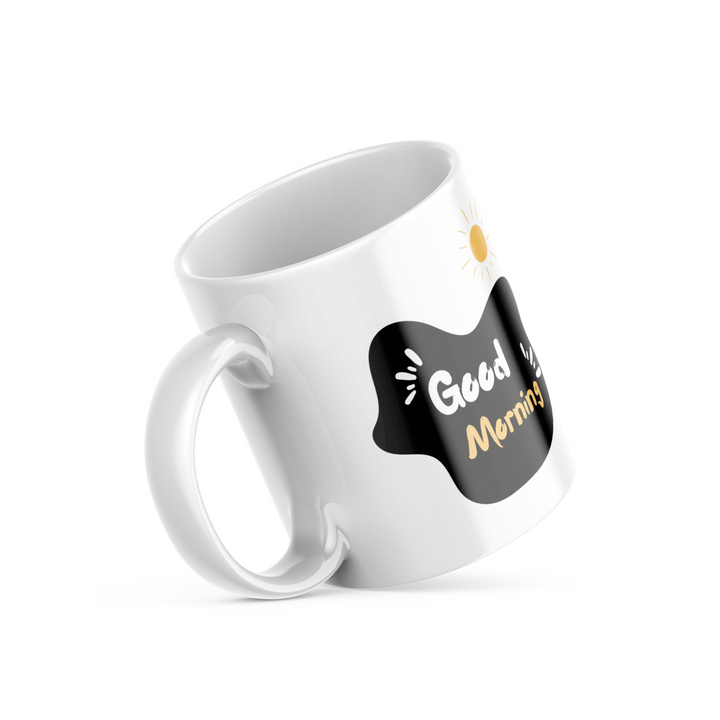 A set of two ceramic mugs, one with various playful cartoon faces and the other with a 'Good Morning' message accompanied by a sun illustration.