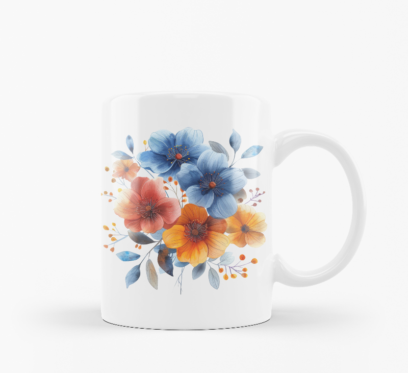 Two ceramic mugs, one with a 'Good Morning' message and a sun design, and the other featuring a floral arrangement of blue and orange flowers.