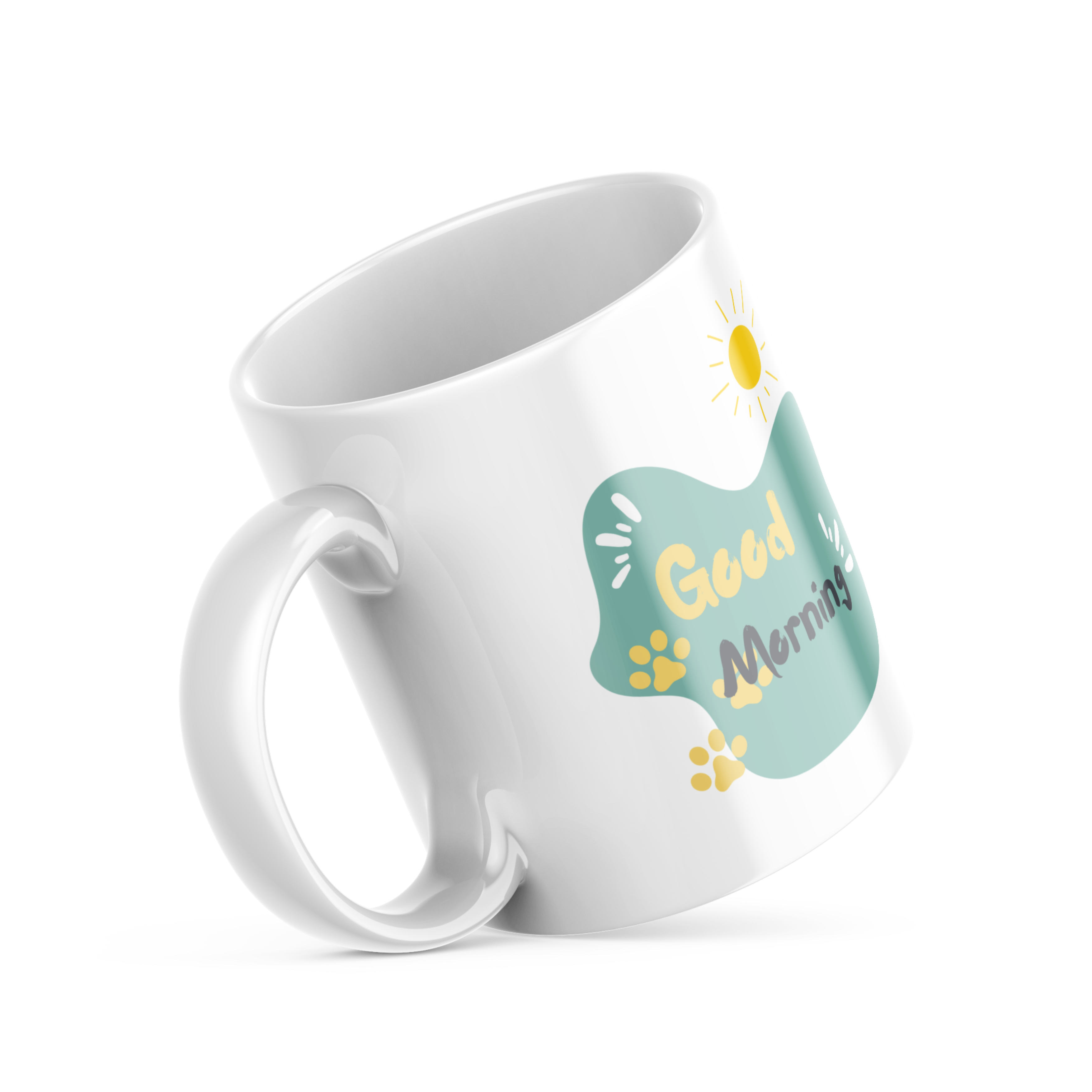 A ceramic coffee mug with a colorful cat face pattern on one side and a 'Good Morning' message with paw prints on the other, placed inside and outside of the mug.