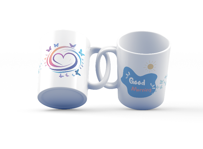 Two ceramic mugs, one with a colorful heart and butterflies design, and the other with a 'Good Morning' message with butterfly accents.