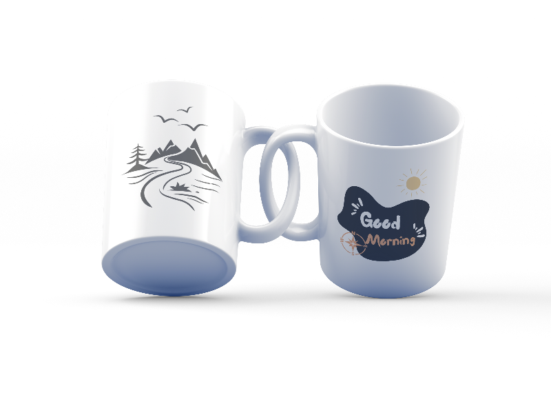 Two ceramic mugs, one with a mountain design and the other with a 'Good Morning' message and a sun illustration.