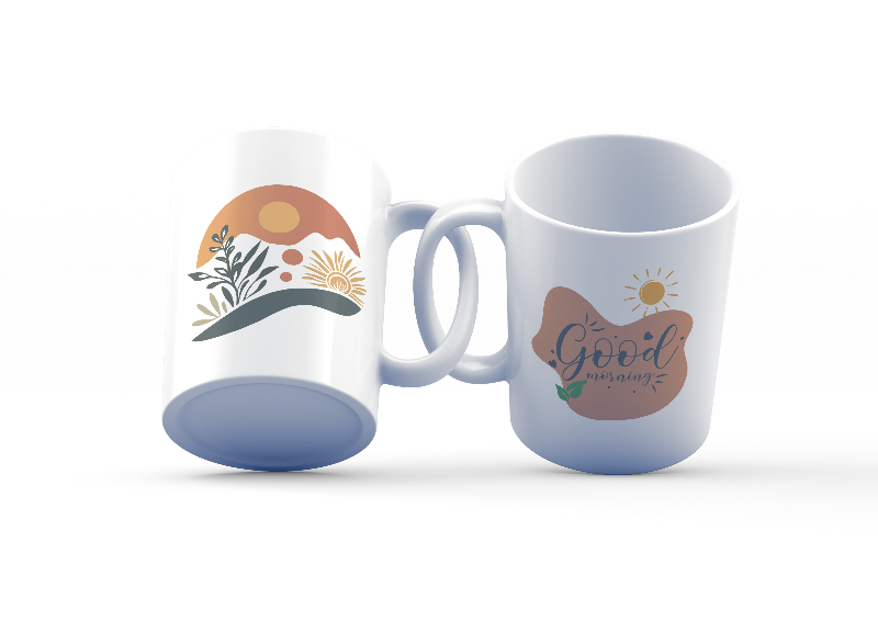 A set of two ceramic mugs, one with a minimalist sunrise design and the other with 'Good Morning' text in a natural tone, both featuring nature-inspired illustrations.