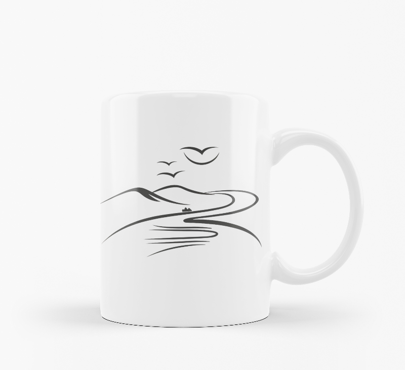 Two ceramic mugs side by side, one with a mountain design and the other with a sunrise and sunburst design, both featuring text 'Good Morning'.