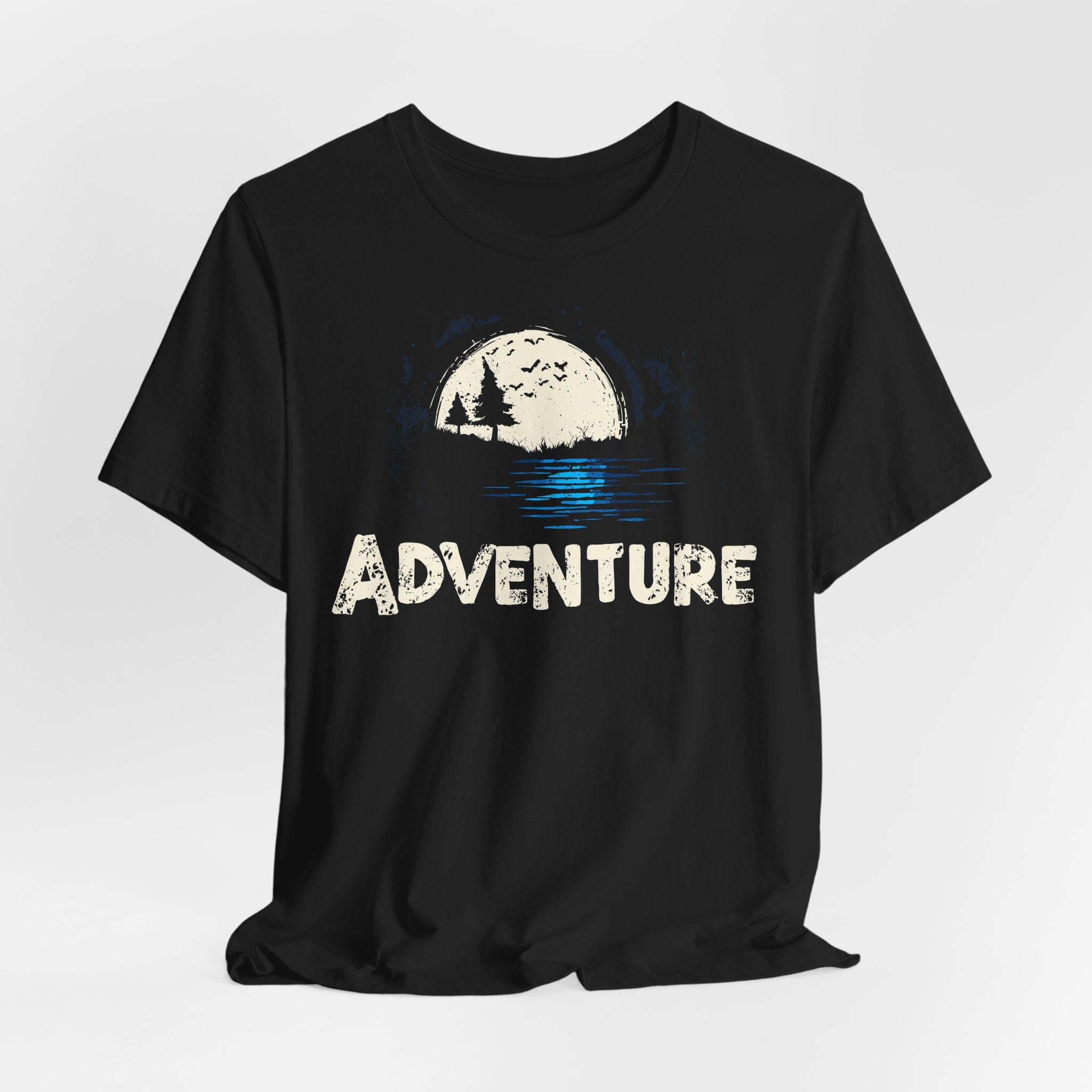 Black t-shirt with 'ADVENTURE' graphic design on a white background