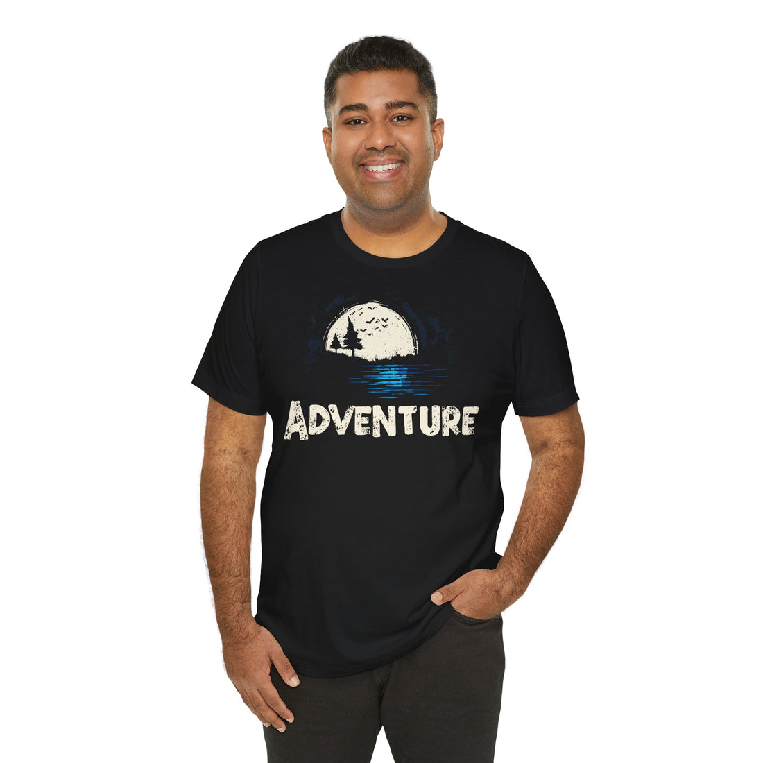 Man wearing a black t-shirt with 'ADVENTURE' and a graphic design on a white background