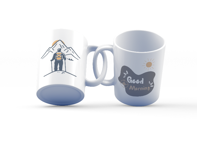 Two ceramic mugs, one with a mountain and sun design and the other with a 'Good Morning' message, both in minimalist style.