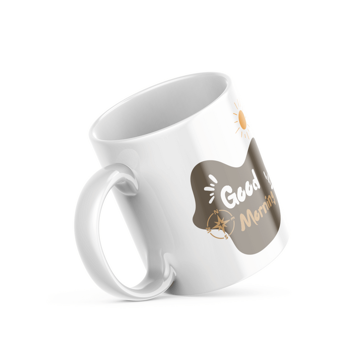 Two ceramic mugs, one with a mountain and sun design and the other with a 'Good Morning' message, both in minimalist style.