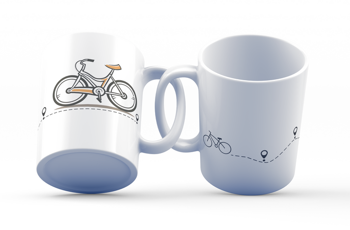 Two white ceramic mugs with a bicycle route travel design, one showing a profile view and the other showing the mug from the handle side. The mugs are placed against a white background.