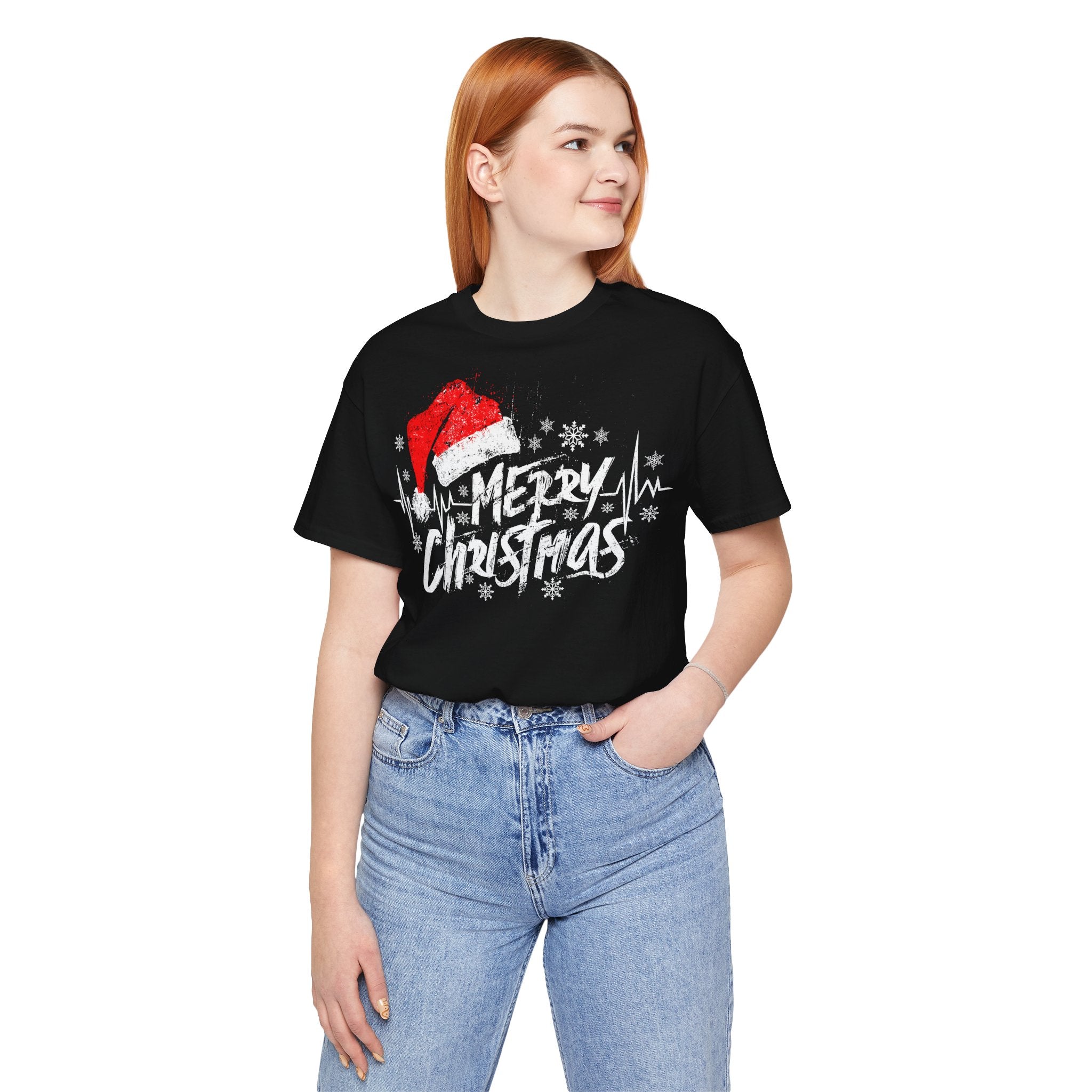 Person wearing a black t-shirt with 'Merry Christmas' design on a white background