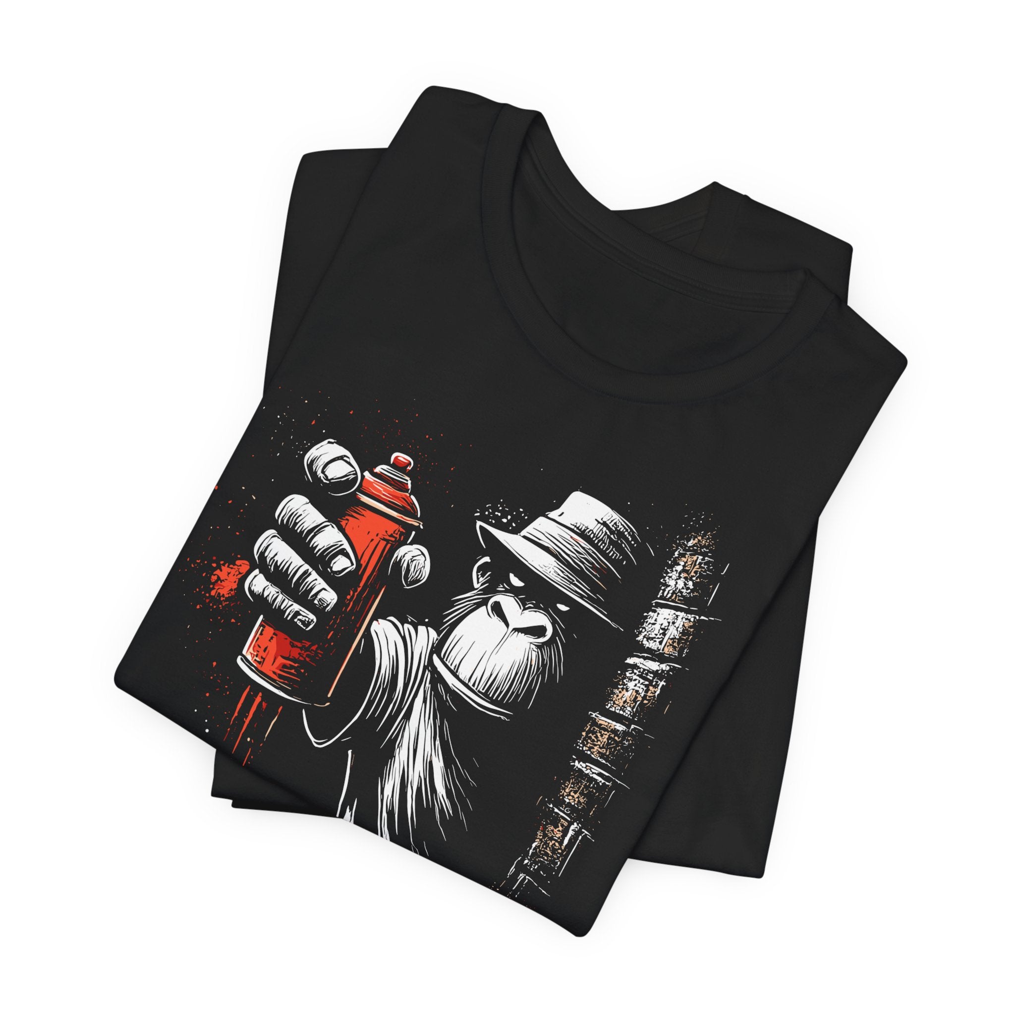 Black t-shirt with a graphic design of a bearded figure holding a spray can on a white background