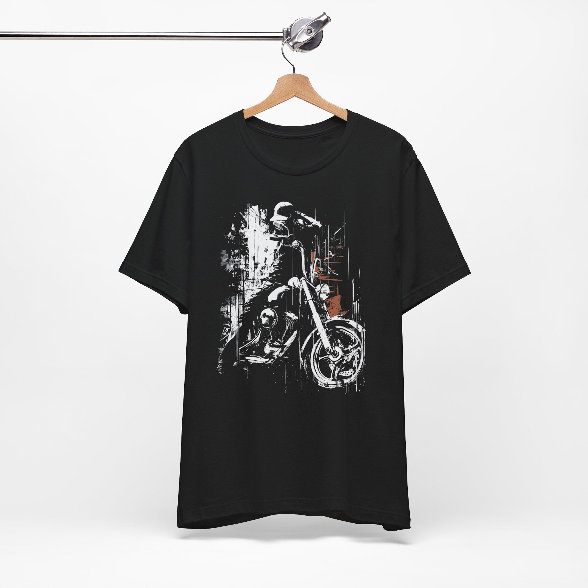 Black t-shirt with a motorcycle graphic on a hanger against a white background