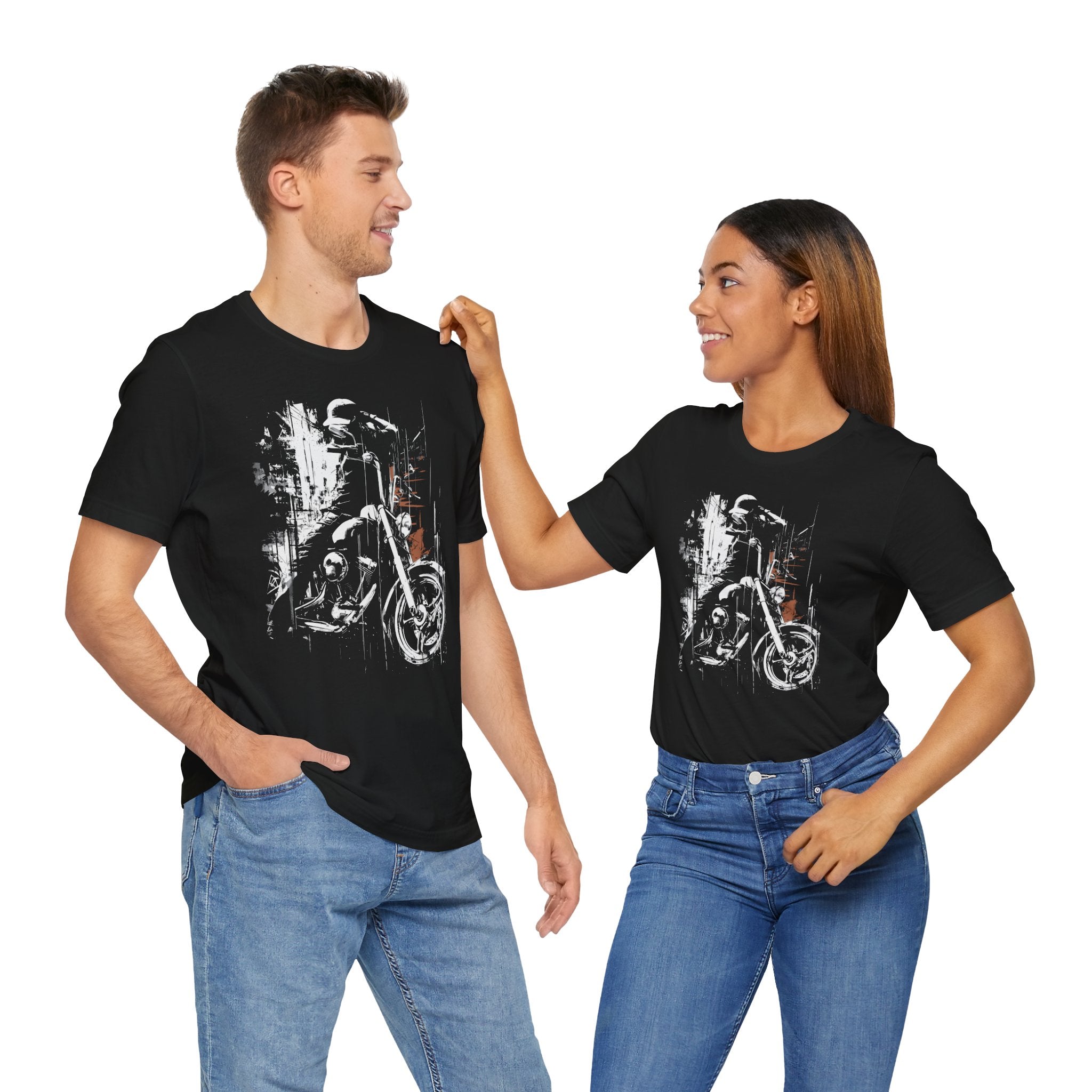 Two people wearing black t-shirts with motorcycle graphics on a white background