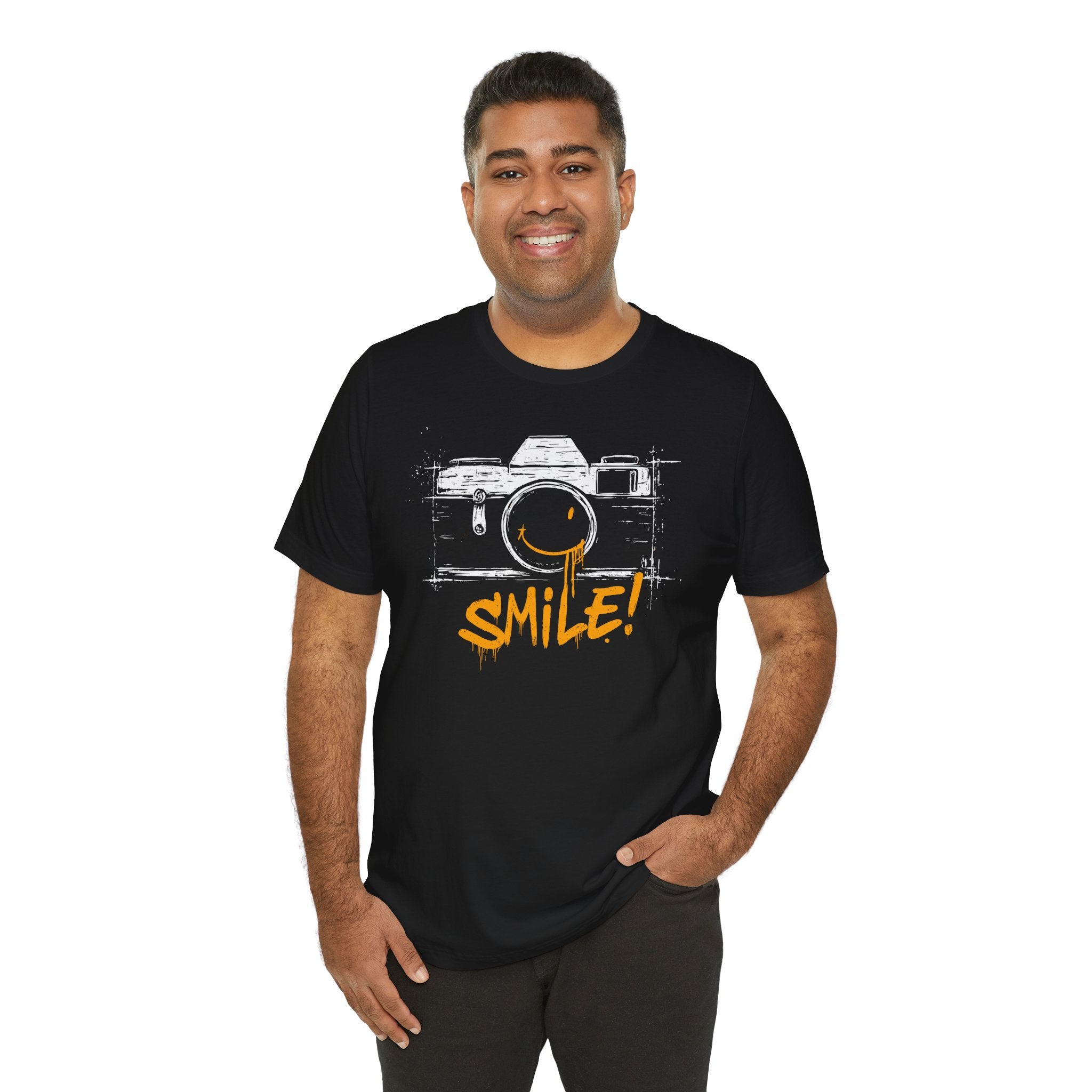 Man wearing a black t-shirt with a camera graphic and 'SMILE!' text on a white background