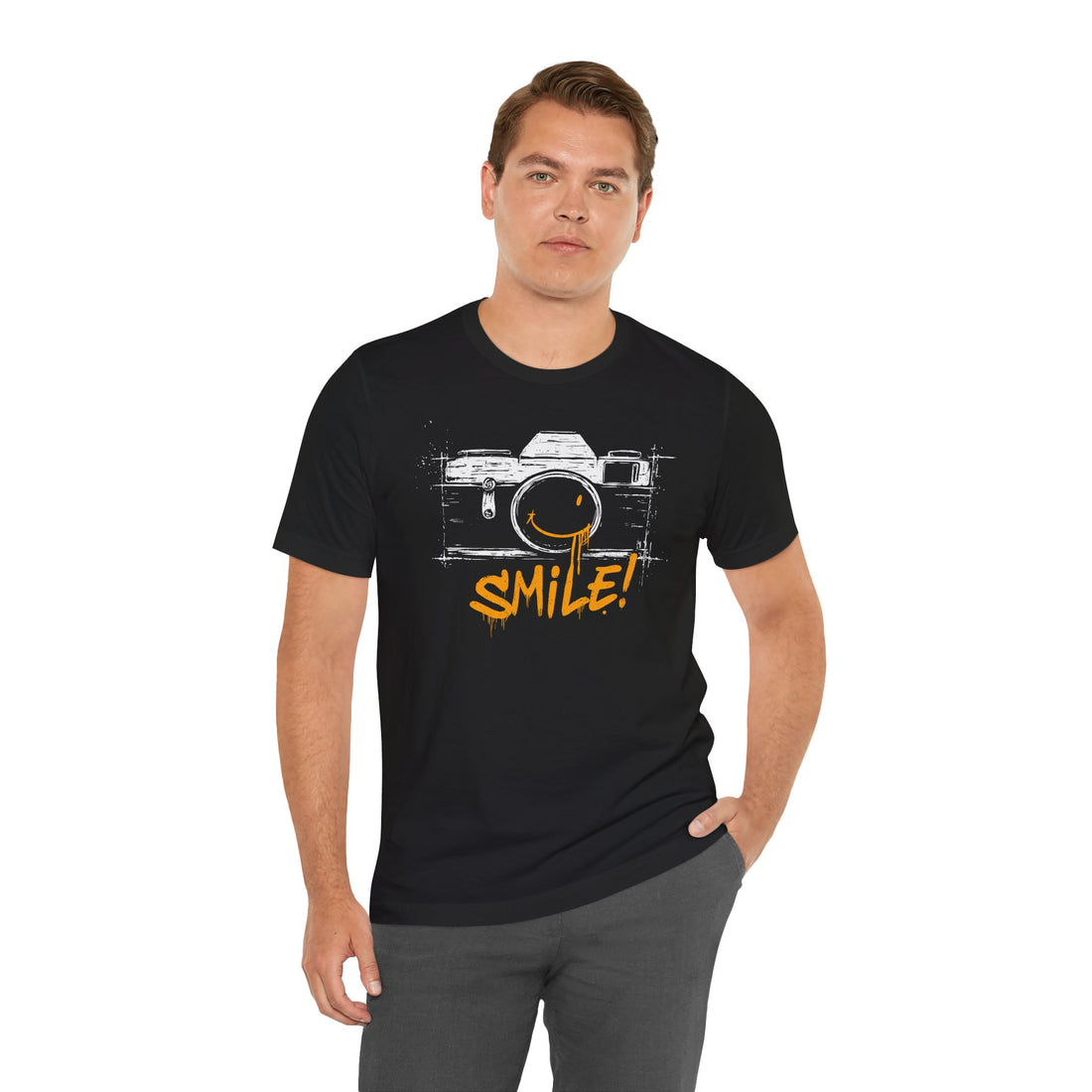 Man wearing a black t-shirt with a camera graphic and 'SMILE!' text on a white background