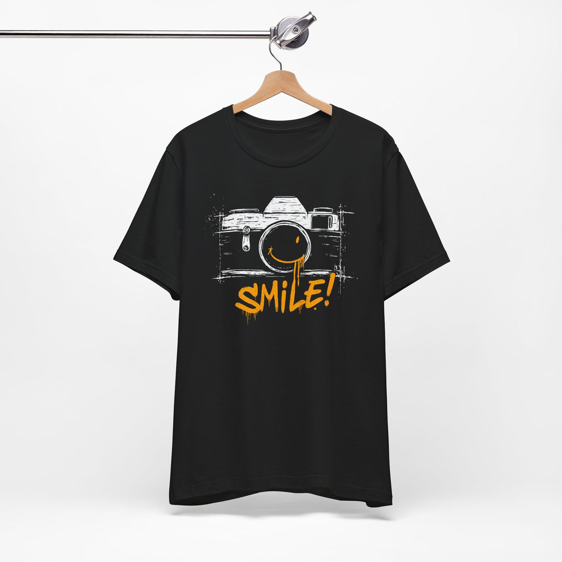 Black t-shirt with a camera graphic and 'SMILE!' text on a white background