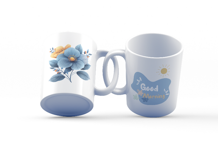 A set of two ceramic mugs, one with a 'Good Morning' message and floral design, and the other featuring a blue flower illustration.