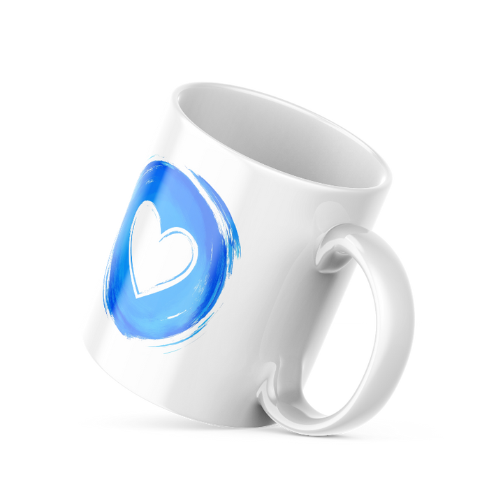 Two ceramic coffee mugs, one with a blue heart design and the other with a 'Good Morning' message alongside a sun icon, both with white backgrounds.