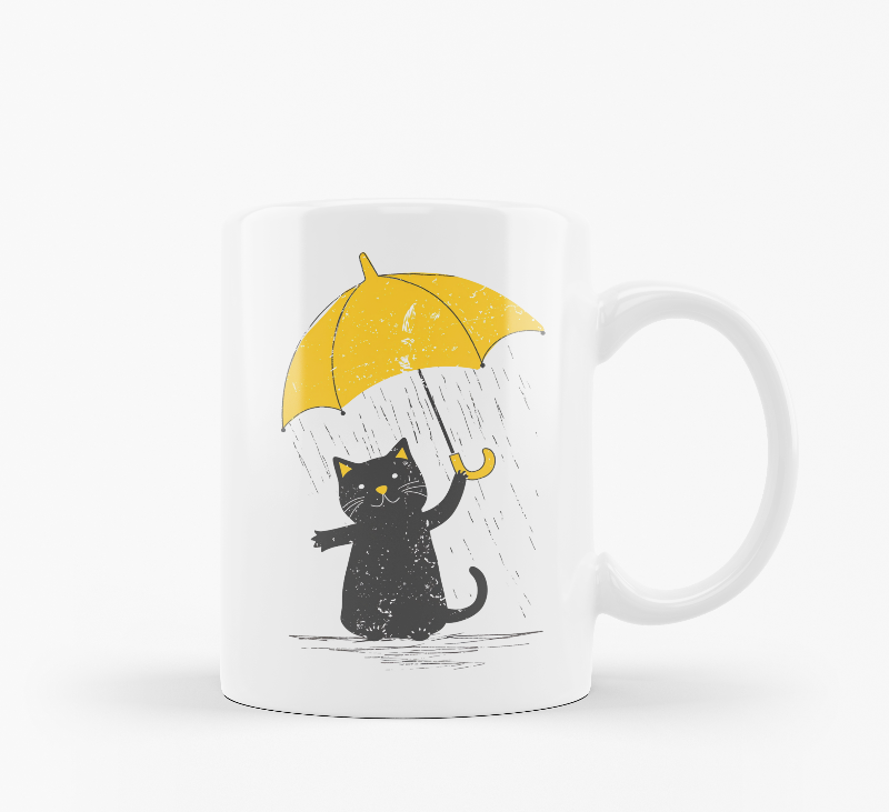 Two ceramic mugs, one with a 'Good Morning' text and paw prints, and the other featuring a black cat holding a yellow umbrella.