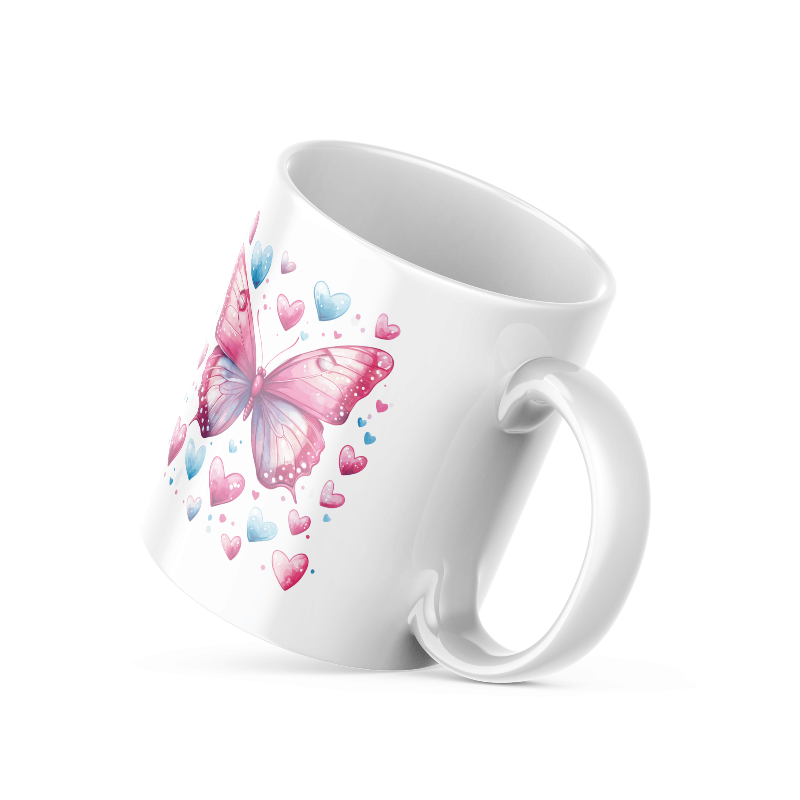 A ceramic coffee cup with a pink butterfly and hearts design, and a text message that reads 'Good Morning'.