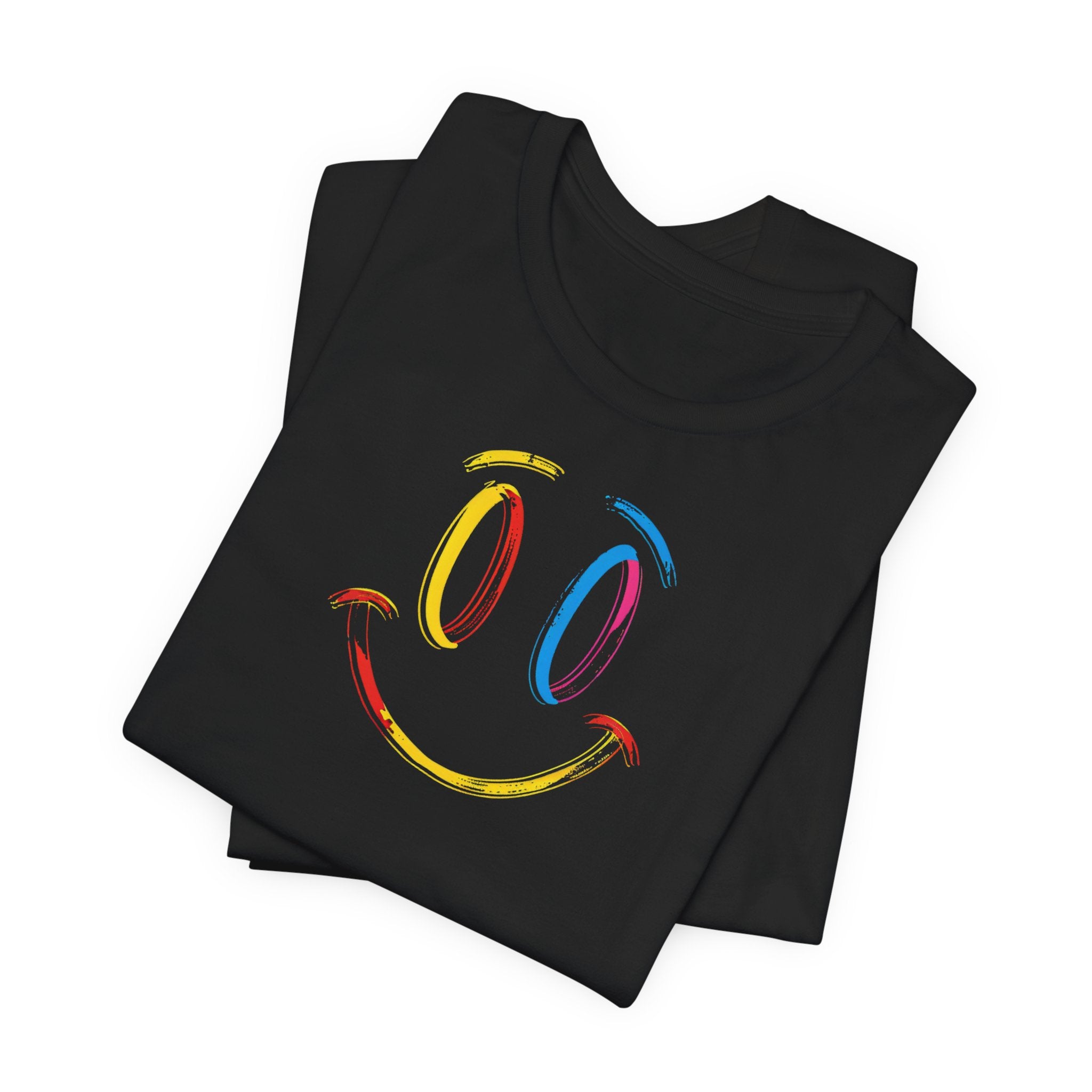 A black t-shirt with a vibrant colorful smiley face design on the front.