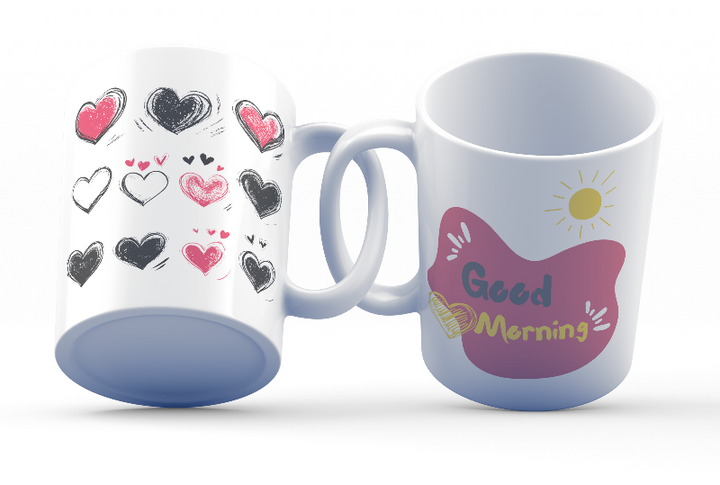 A ceramic coffee mug with a double-sided design featuring a heart pattern on one side and a 'Good Morning' message with a heart motif on the other, presented in a white background.