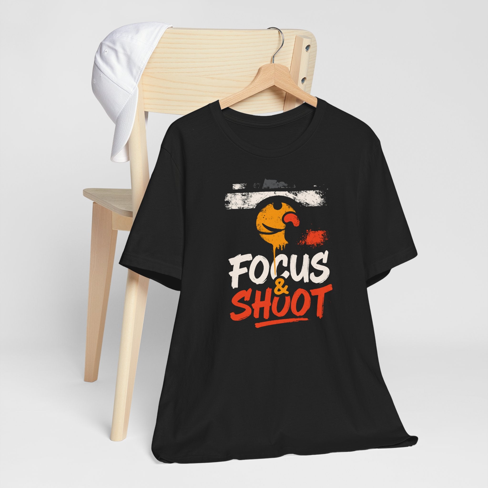 Black t-shirt with 'Focus & Shoot' graphic design on a white background
