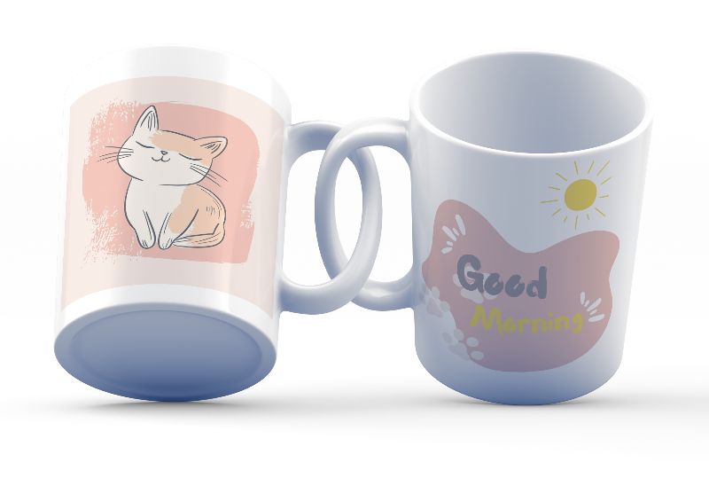 A set of ceramic coffee mugs with double-sided prints. One mug features a minimalist illustration of a cat on a beige background with a 'Good Morning' message and paw prints.