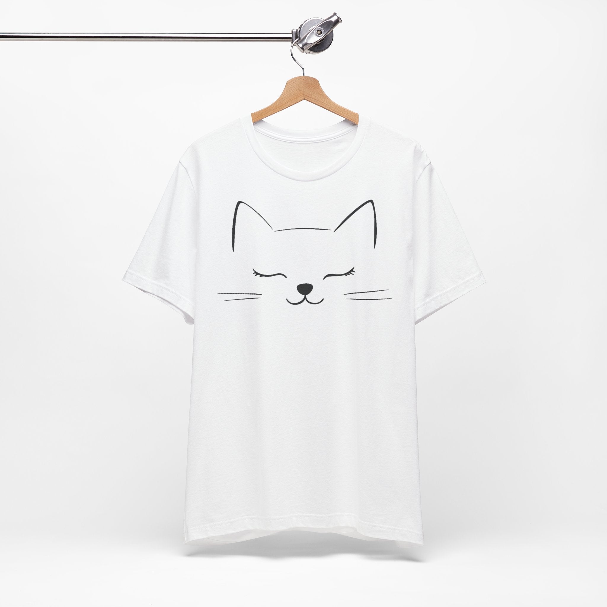 White cotton T-shirt with a minimalist design of a closed-eyed cat face on the front.
