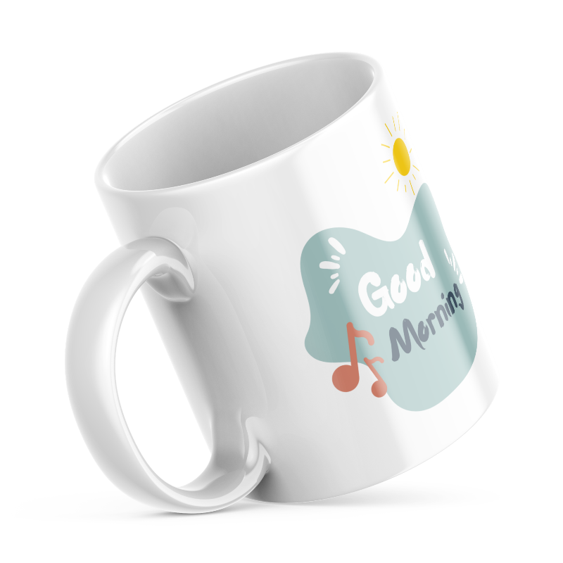 Two ceramic coffee mugs with floral and musical designs. One mug has a floral treble clef design with the text 'Good Morning' and musical notes, while the other has a simple 'Good' design with a sun motif.