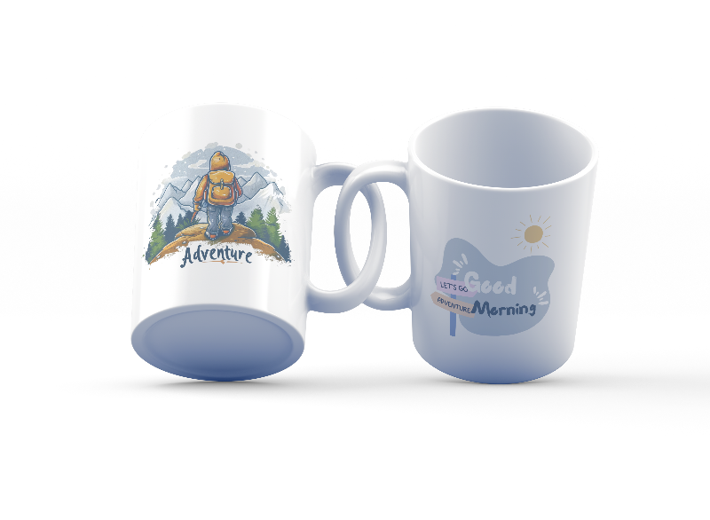 A set of two ceramic mugs, one with an adventure theme featuring a hiker on a mountain, and the other with a 'Good Morning' message, both with a snowy mountain backdrop.