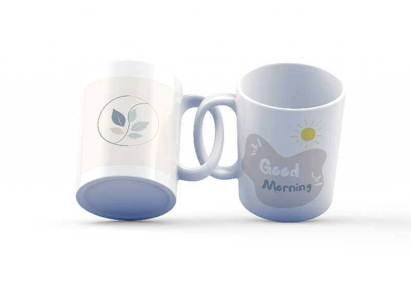 Two ceramic mugs, one with a 'Good Morning' message and a sun icon, and the other with a 'Good Mornin' spelling mistake, both with nature-inspired leaf designs.