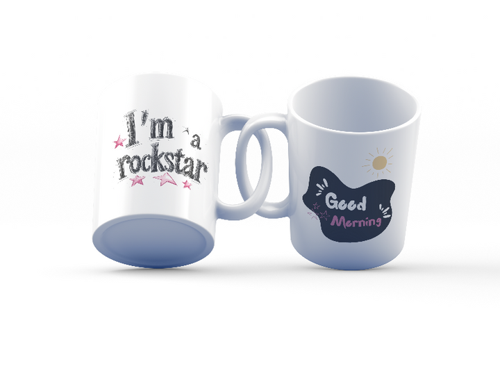 Two ceramic mugs side by side, one with the phrase 'I'm a Rockstar' and stars, the other with 'Good Morning' and a sun graphic, both in black, white, pink, and yellow.