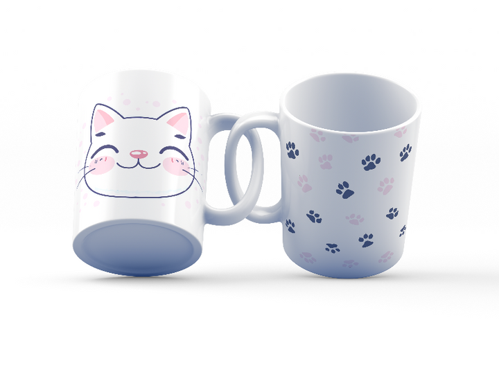 A set of two ceramic mugs, one with a cat face design and the other with a paw print pattern, both in pastel colors.