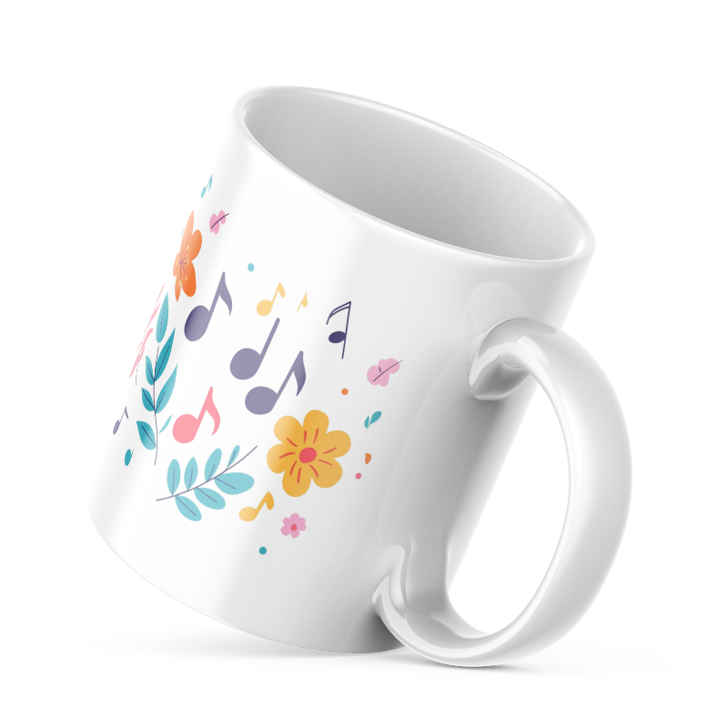 Two ceramic coffee mugs with floral and music notes designs, one with a 'Good Morning' message and the other with a sun and clouds design.