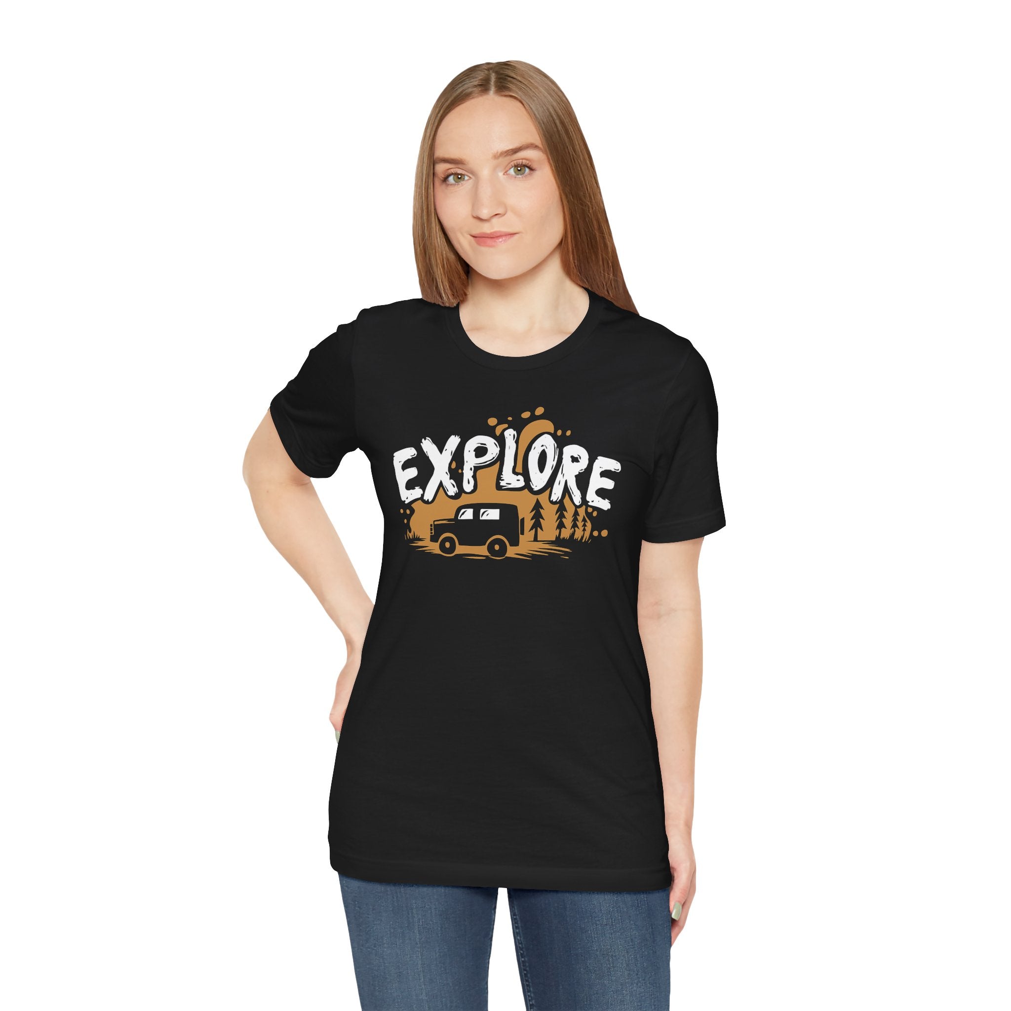 Person wearing a black t-shirt with 'EXPLORE' and a camper graphic on a white background