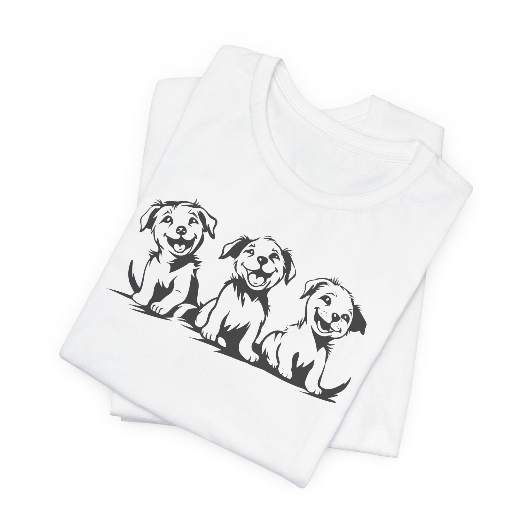 A white t-shirt featuring a graphic design of three smiling puppies sitting side by side.