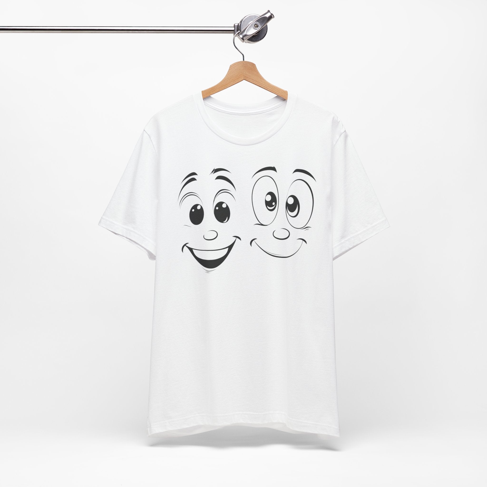 A white cotton tee with a graphic print of two cartoon faces with smiles on it.