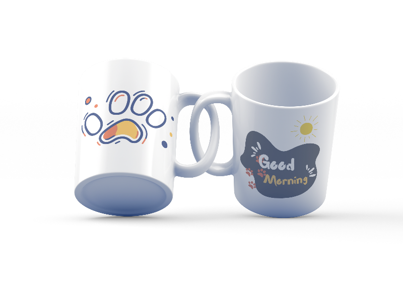 Two ceramic mugs, one with a paw print design and the other with a 'Good Morning' message, both with a white background.