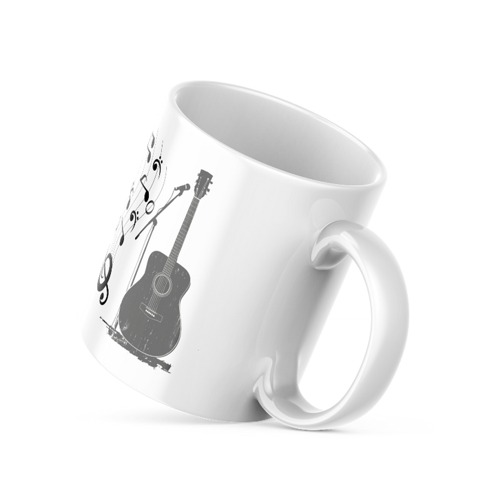 Two ceramic mugs, one with a guitar design and the other with a 'Good Morning' message, both featuring white backgrounds and musical notes.