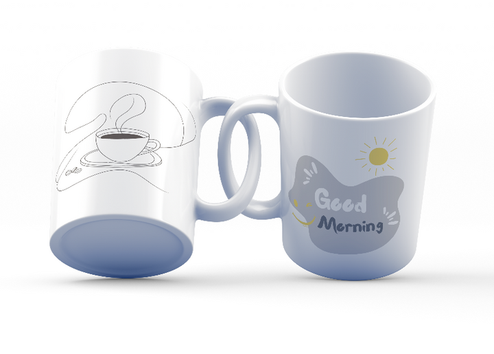Two ceramic coffee mugs with double-sided designs. One mug features a coffee line art illustration with the text 'Good Morning' and the other has a sun and rain design with the text 'Good Mornin'g'.