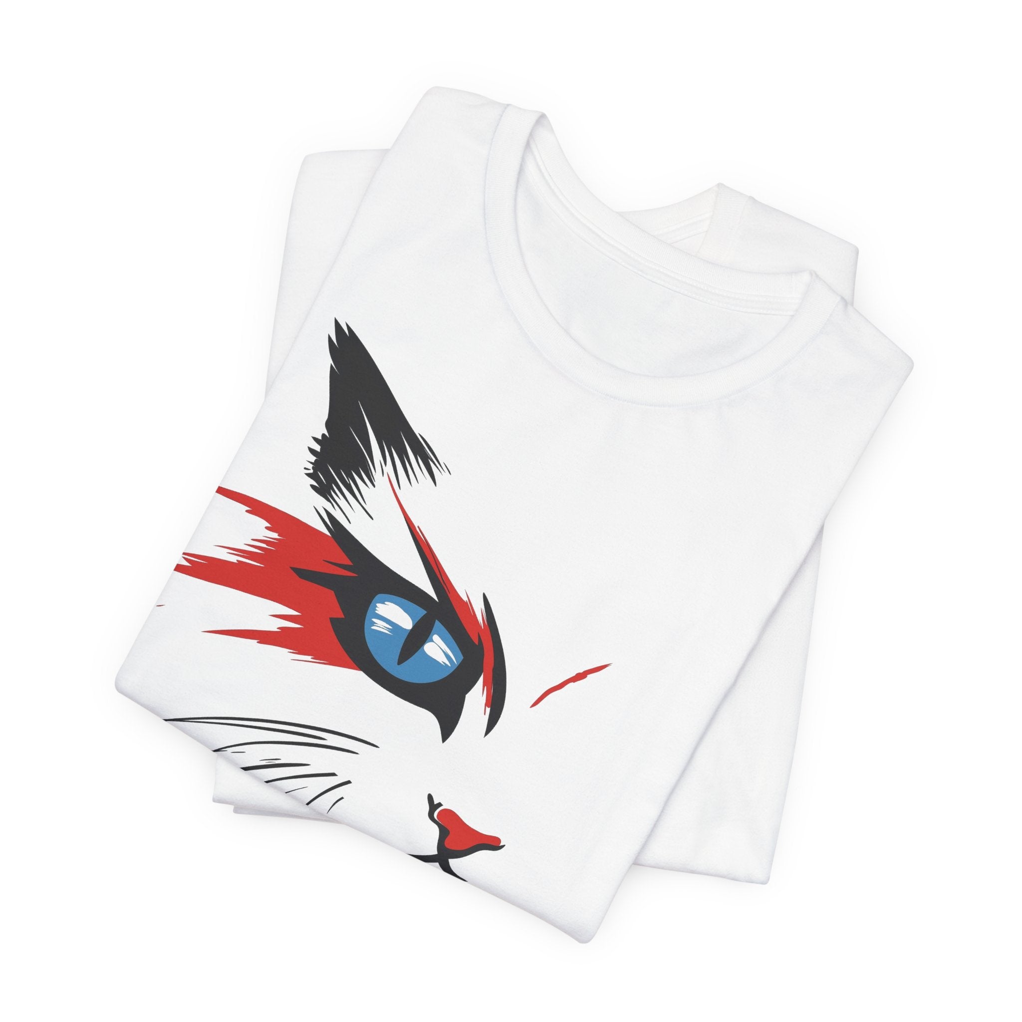 White cotton tee with a bold and artistic design of a cat's face featuring vibrant red, black, and blue colors.