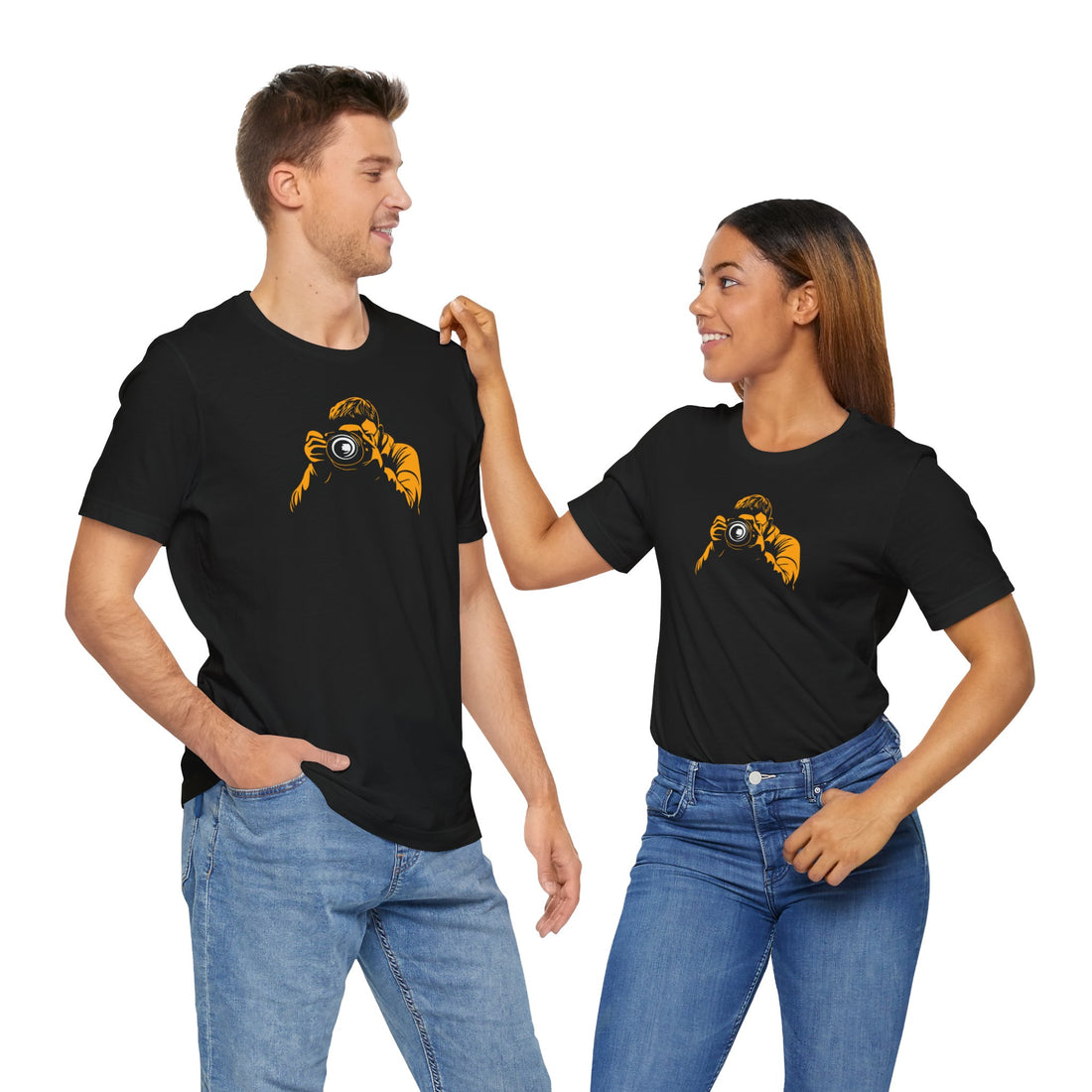 A black crew neck t-shirt with a bold yellow graphic of a photographer holding a camera.