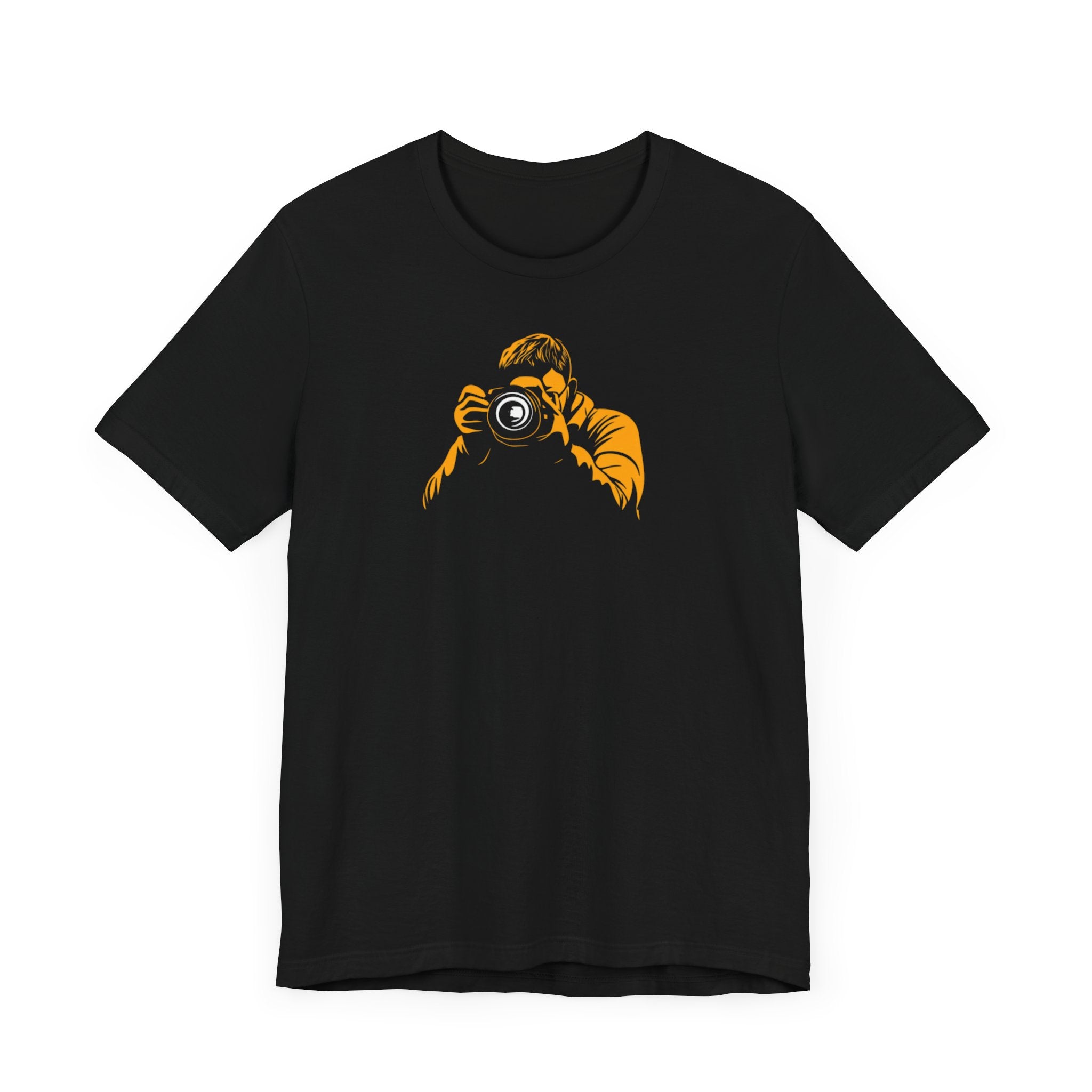 A black crew neck t-shirt with a bold yellow graphic of a photographer holding a camera.