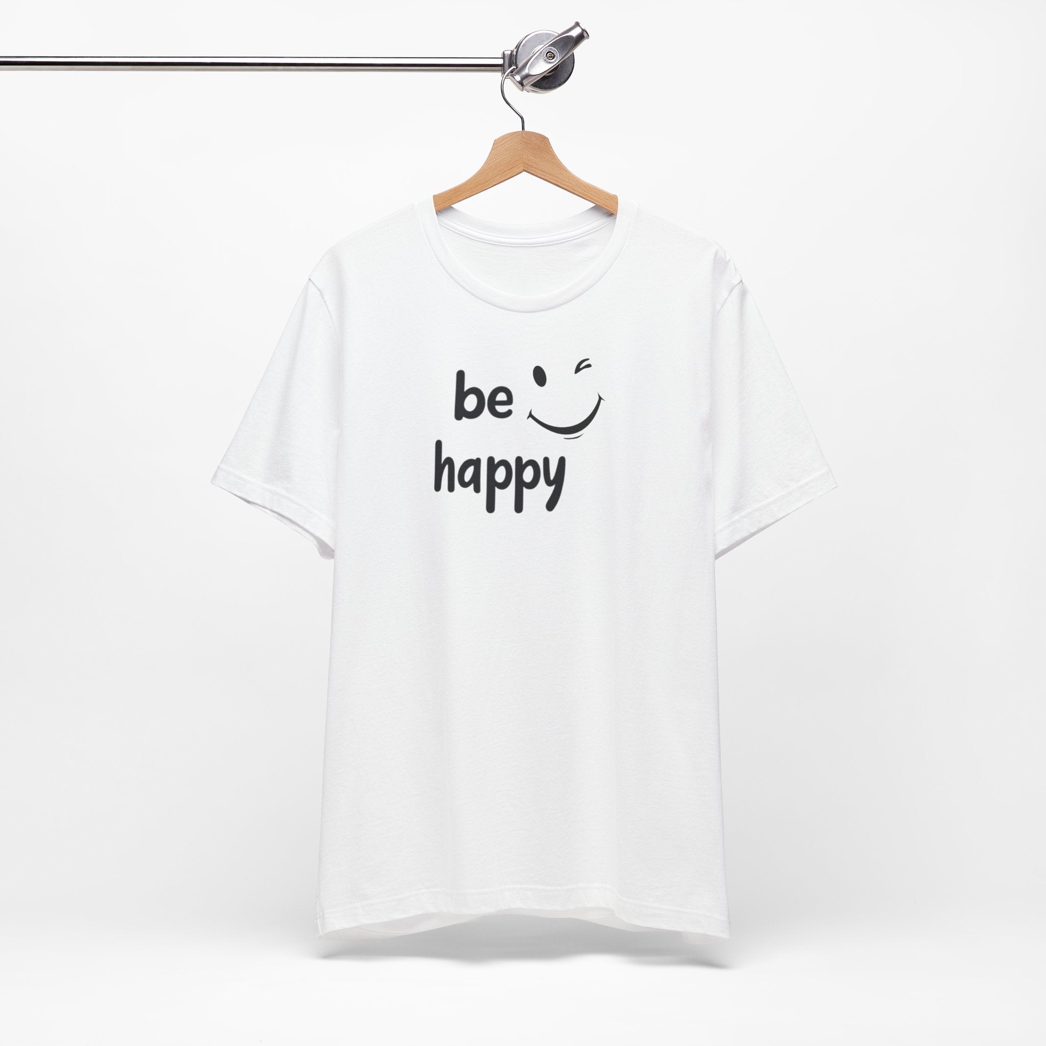 A black crew neck t-shirt with the text 'BE HAPPY' and a smiley face design on the front.