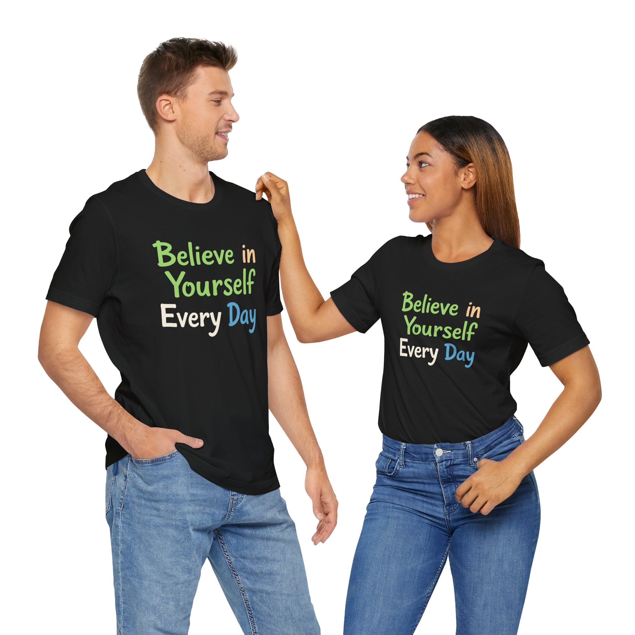 Black unisex t-shirt with the motivational phrase 'Believe in Yourself Every Day' printed in colorful typography.