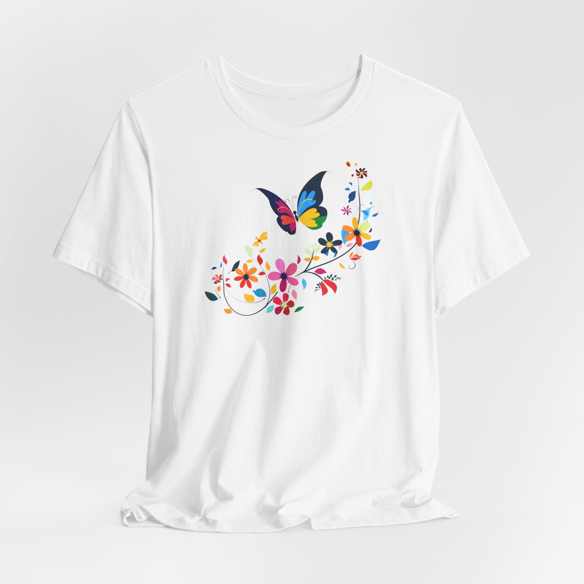 A white crew neck t-shirt with a colorful butterfly and floral pattern on the front.