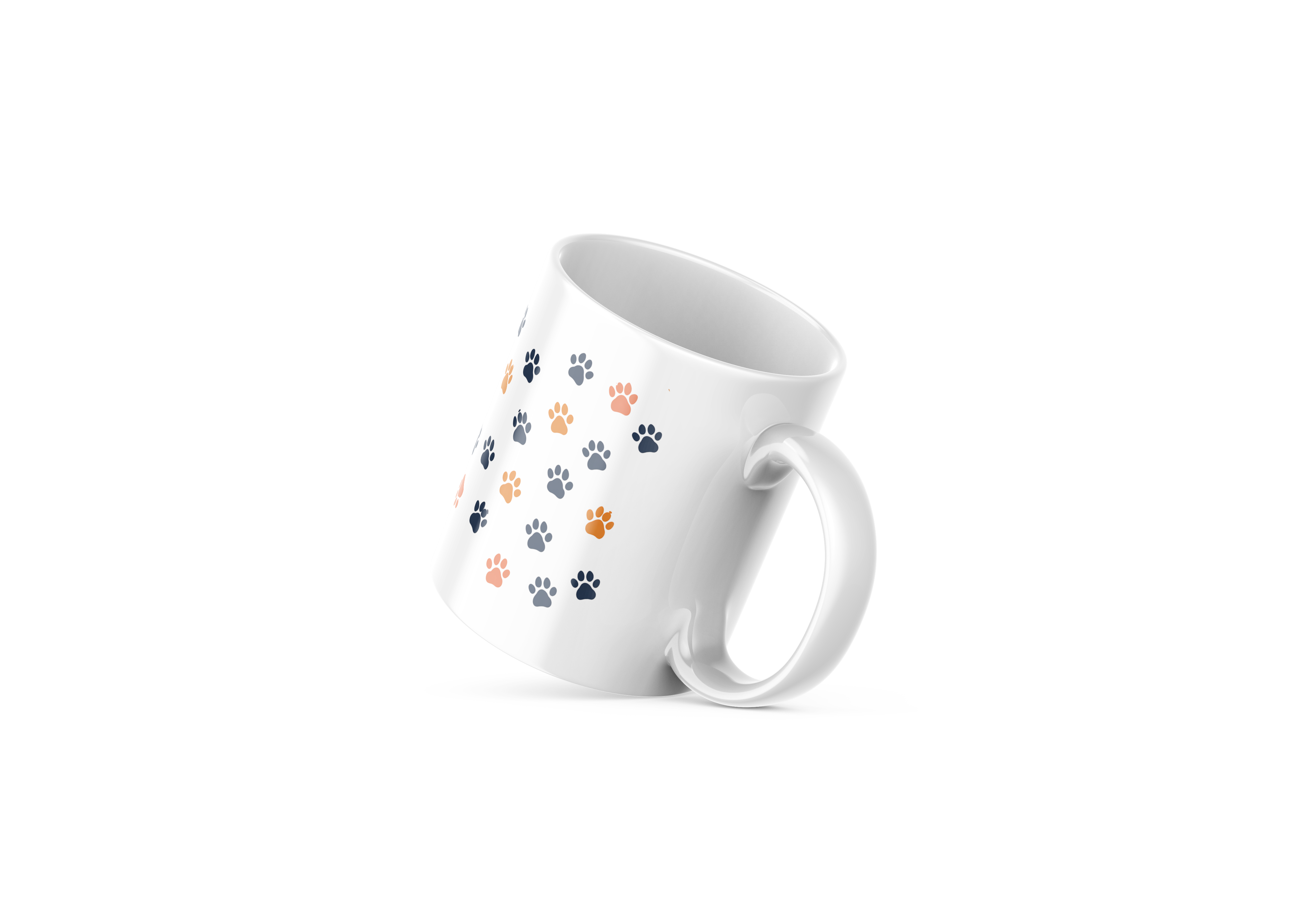 A ceramic coffee mug with a design of a cat face on one side and blue paw prints on the other, against a white background.