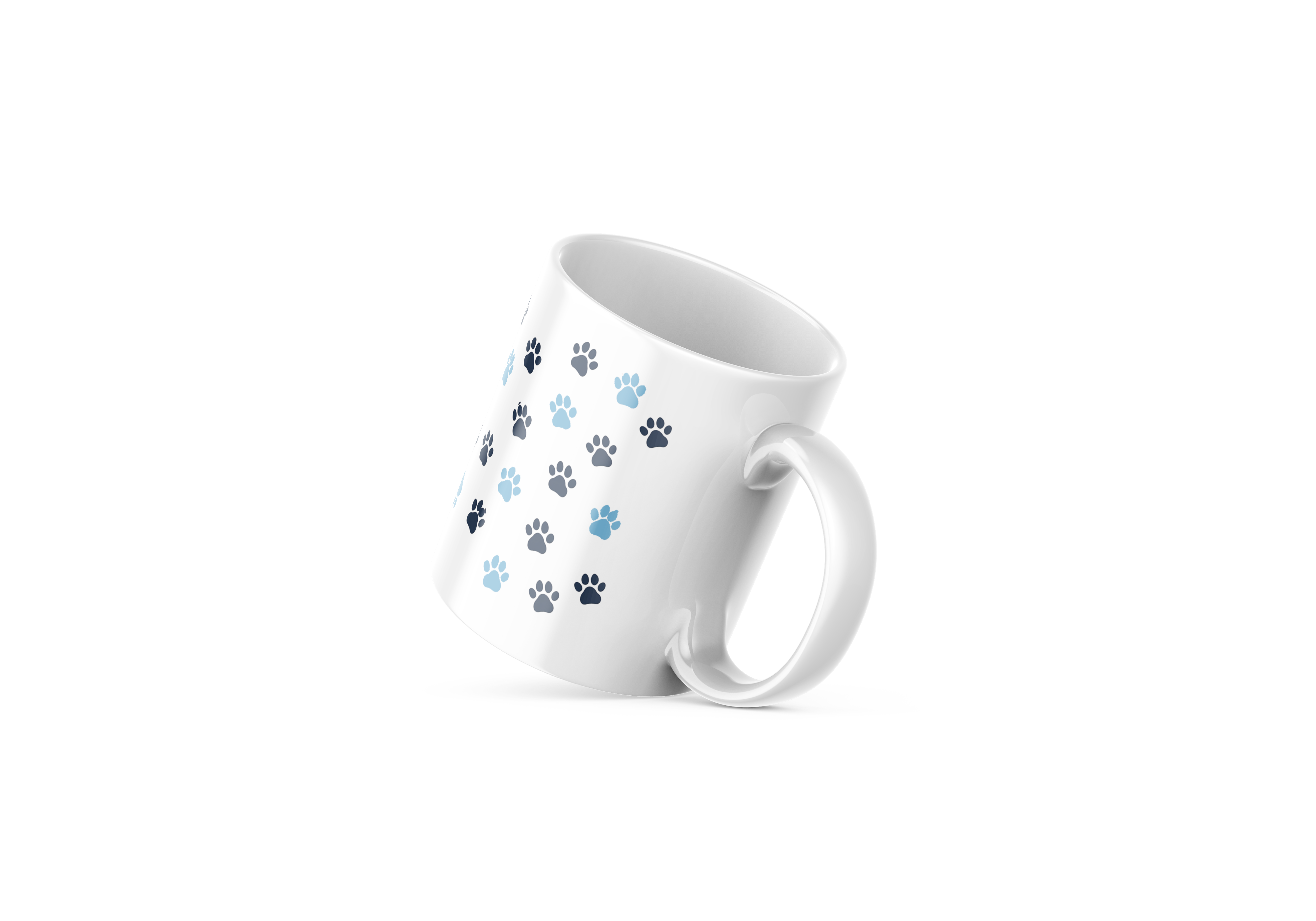 White ceramic mug with cute cat face design and paw prints