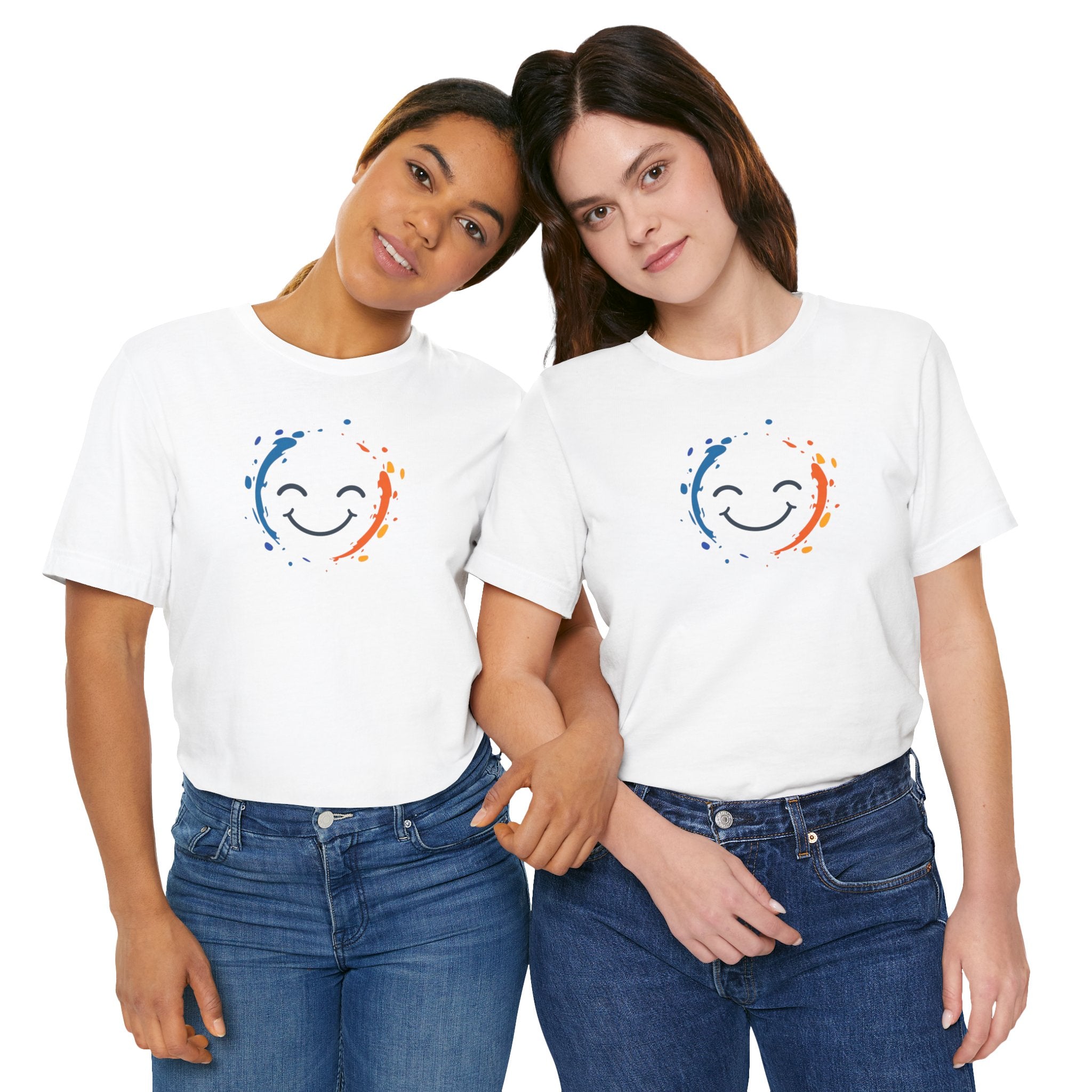 White cotton tee with a vibrant happy face design and color splashes in blue and orange.