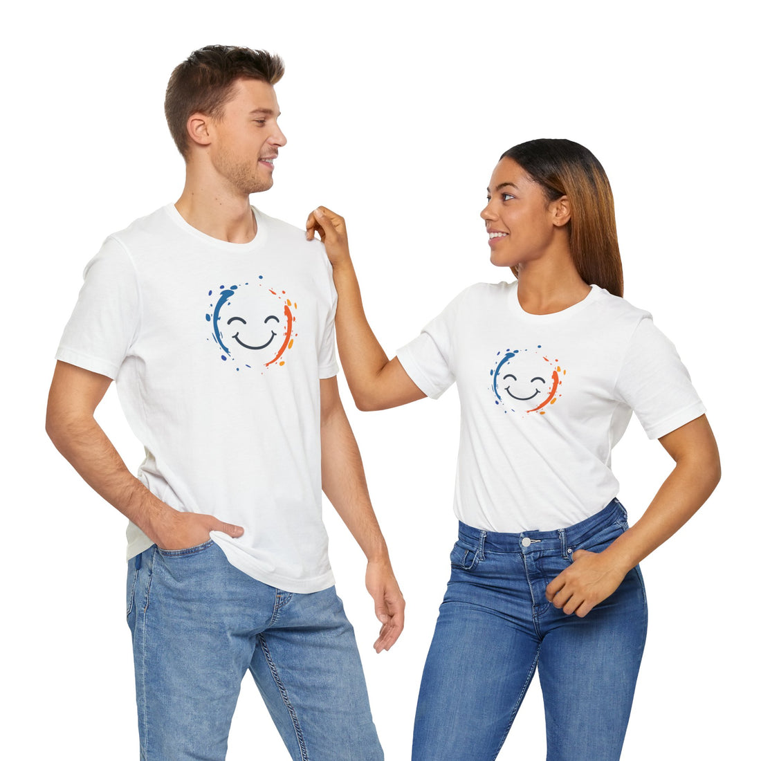 White cotton tee with a vibrant happy face design and color splashes in blue and orange.